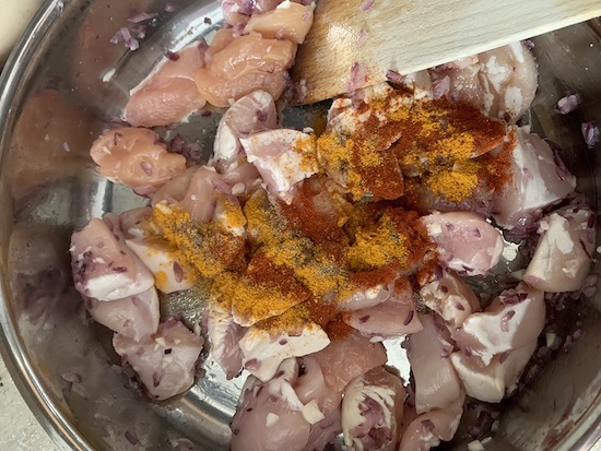 Seasoning of the chicken breasts. Photo - Andrea